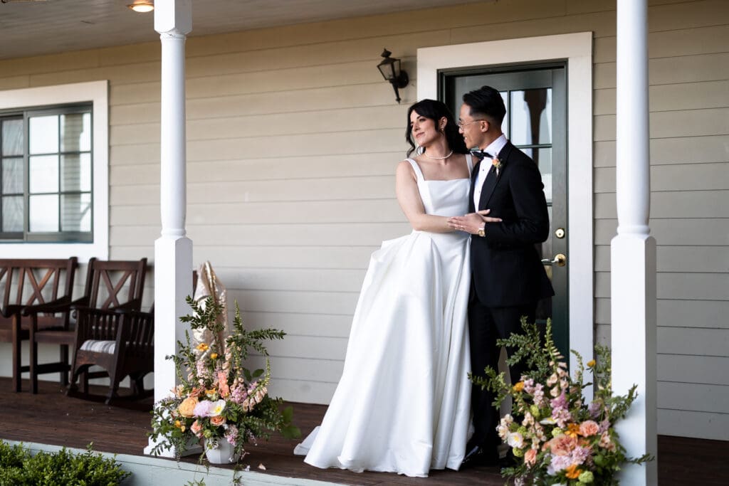 Bride and groom posing for a photo at Vine Hill House wedding post-ceremony