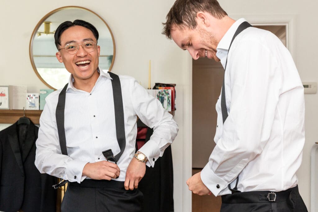 Groomsmen laughing and getting ready for Sonoma County wedding ceremony