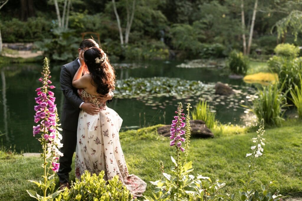Bride and groom kissing at Nestldown wedding venue after their wedding