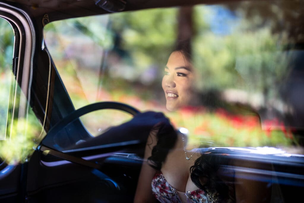Reflection of bride smiling before wedding ceremony at Nestldown