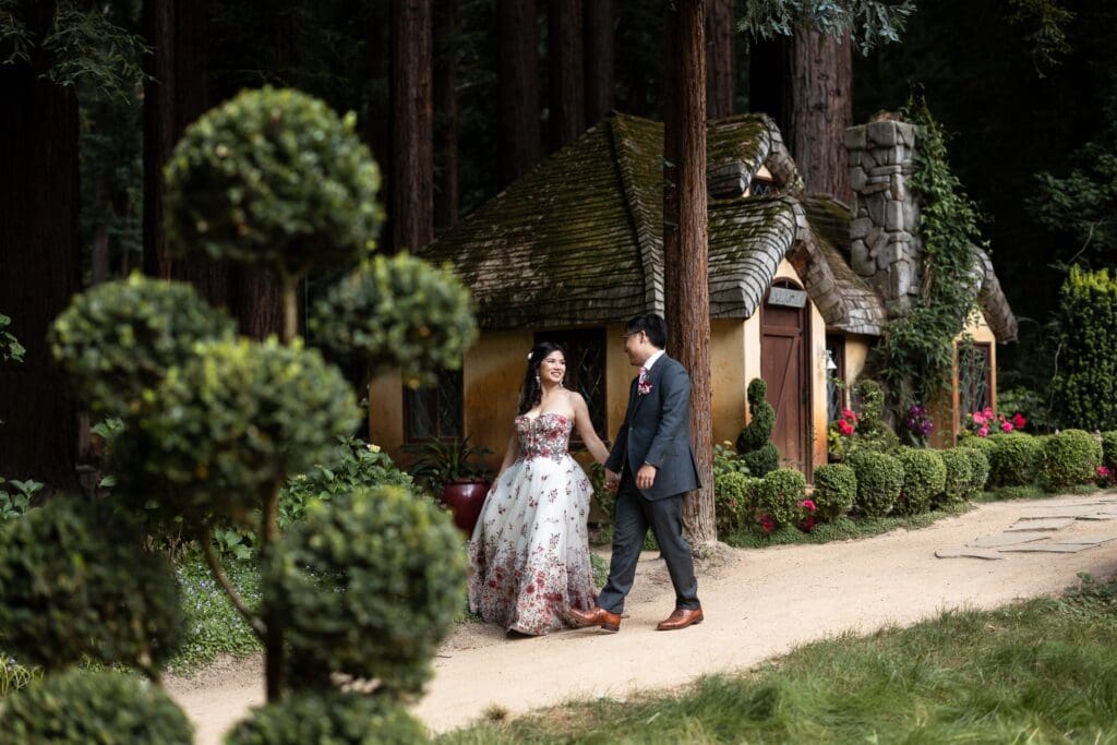 Bride and groom walking hand-in-hand at Nestldown wedding