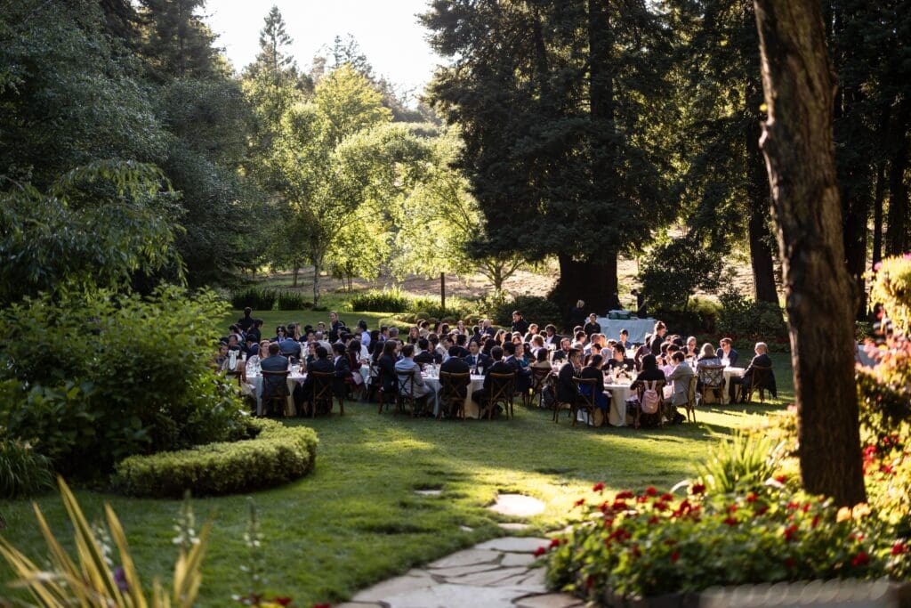 Nestldown Northern California venue wedding guests await for wedding ceremony for Santa Cruz Mountains wedding
