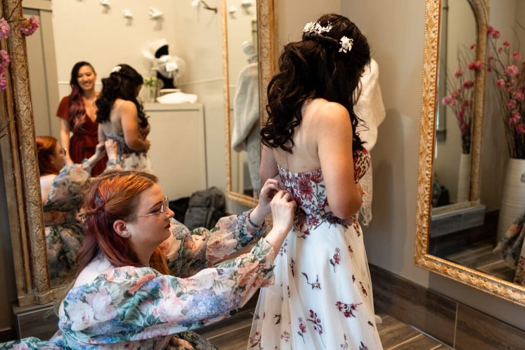 Adjusting the bridal gown before Northern California wedding