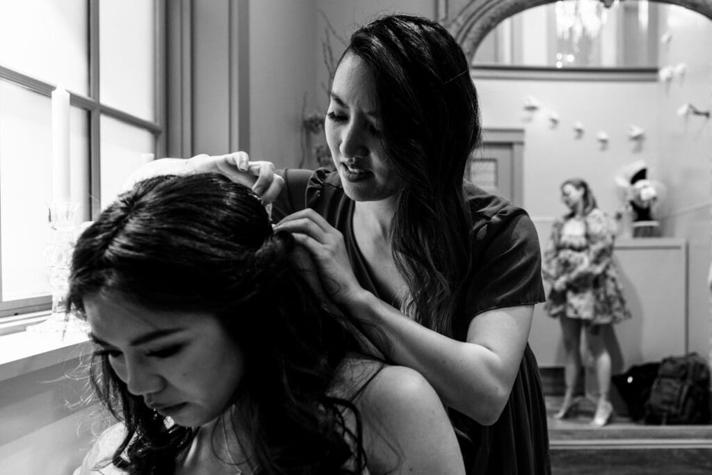 Bride getting their hair done for their Nestldown wedding