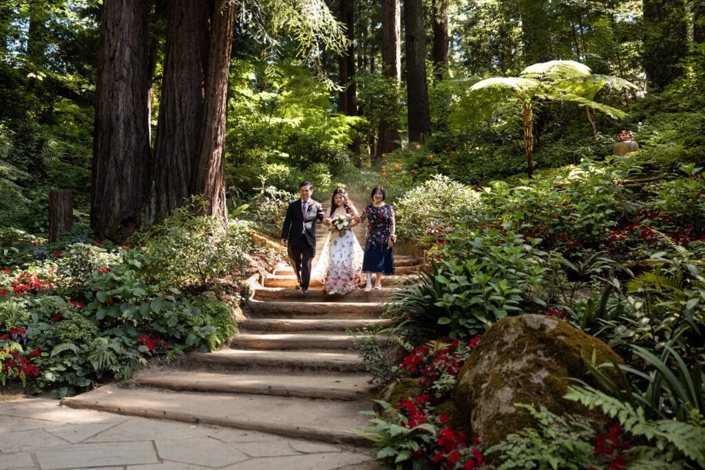 Bride walking down the aisle at outdoor venue in Nestldown
