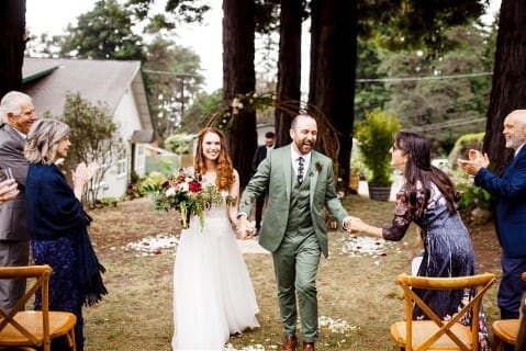 Bride and groom exiting wedding ceremony in Northern California