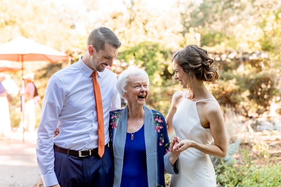 Grandmother smiling at bride during wedding photos in Northern California
