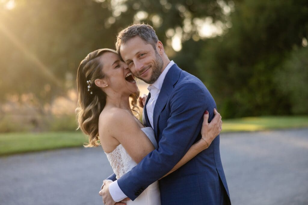 Golden hour close up photo of bride and groom at Flying Cloud Farm