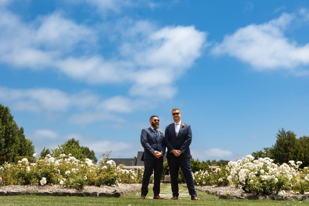 Grooms standing on property at Garden Valley Ranch wedding venue