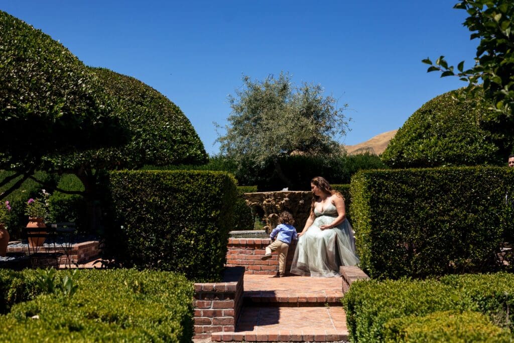 Garden Valley Ranch property with woman and little girl seated
