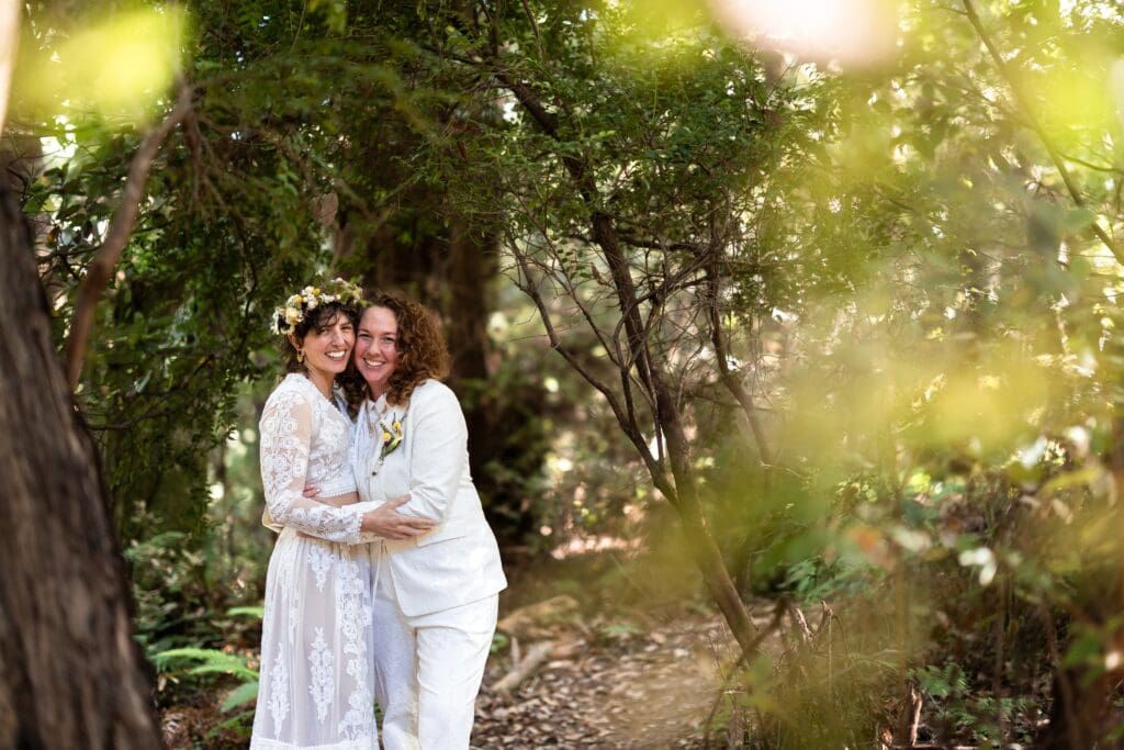 Brides hugging at Gualala Arts Center in Gualala CA