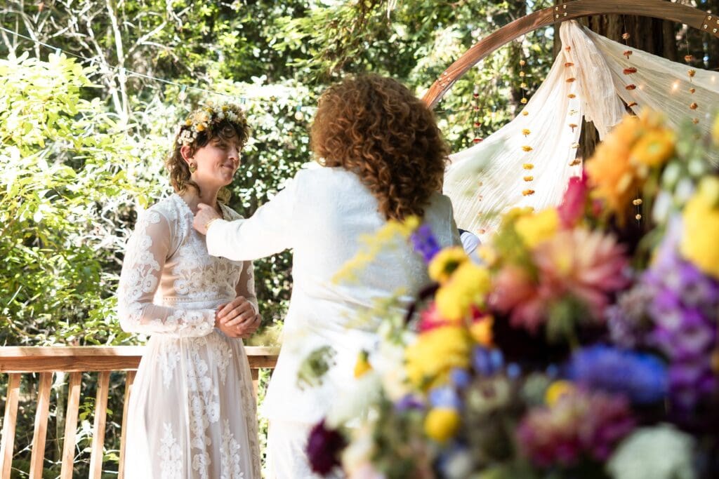 Brides at wedding ceremony in Gualala, CA