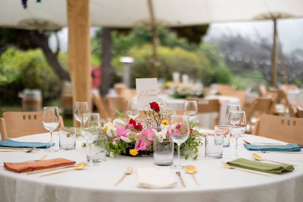 Wedding reception table place setting at Holly’s Ocean Meadow in Fort Bragg, CA