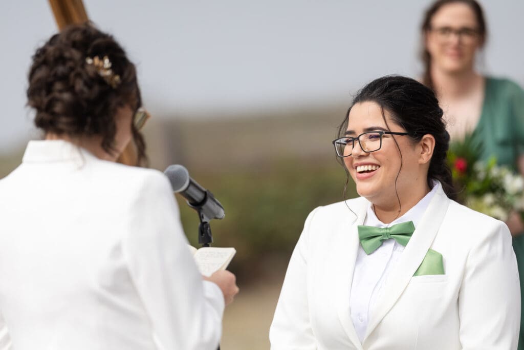 Brides exchanging vows in Fort Bragg wedding ceremony