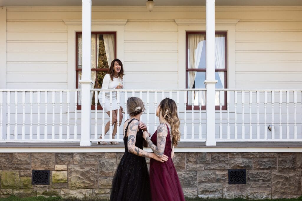 Brides holding each other at Olympia's Valley Estate