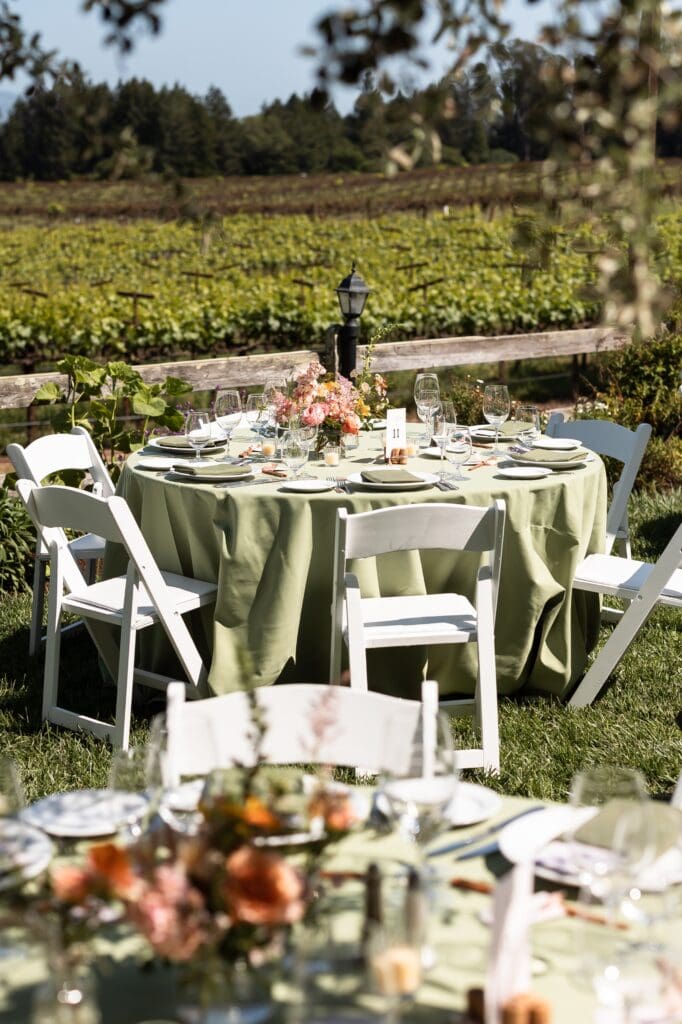 Wedding reception setup with table and chairs at Vine Hill House in Sonoma County