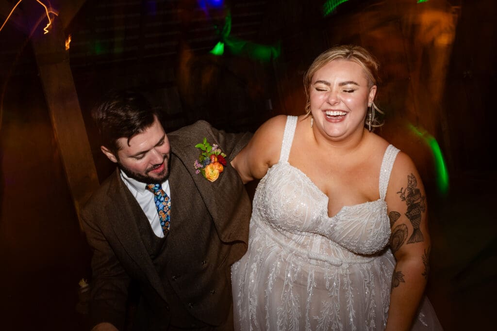 Bride laughing on the dance floor at The Haven at Tomales Wedding reception