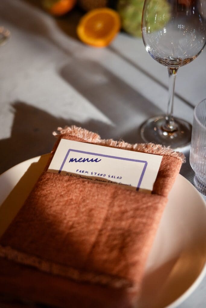 Menu at wedding reception table at The Haven at Tomales Wedding