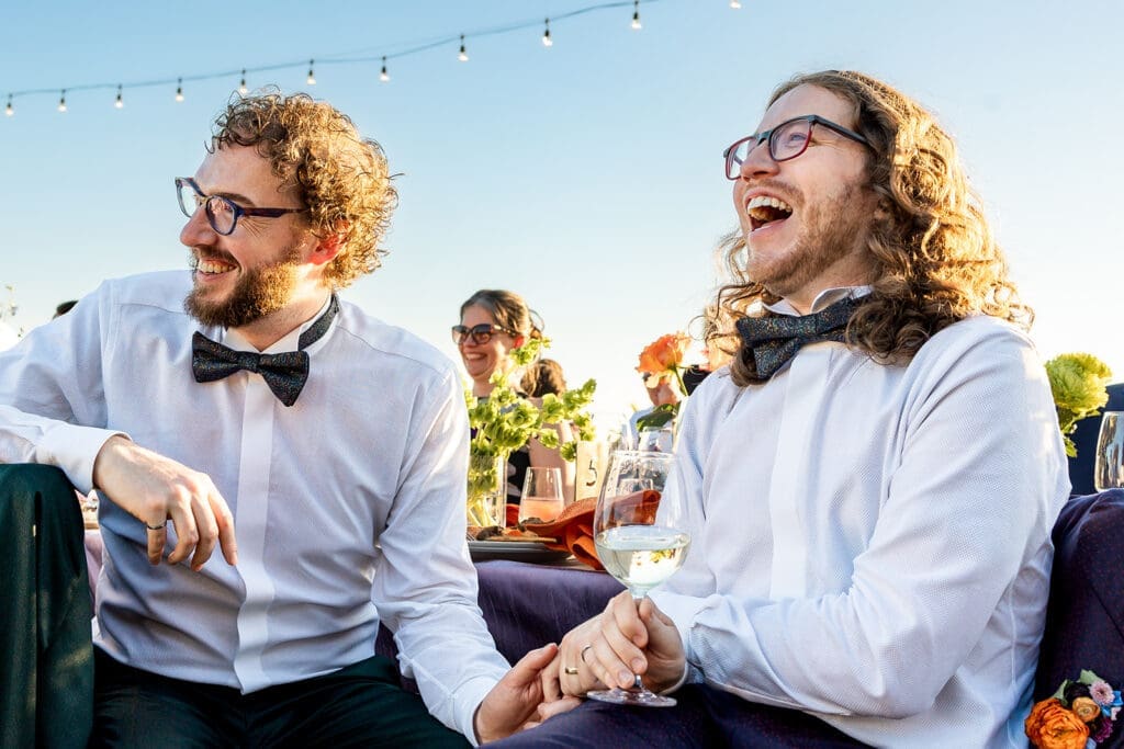 LGBT couple enjoy their colorful Sonoma wedding reception at Gundlach Bundschu Winery.