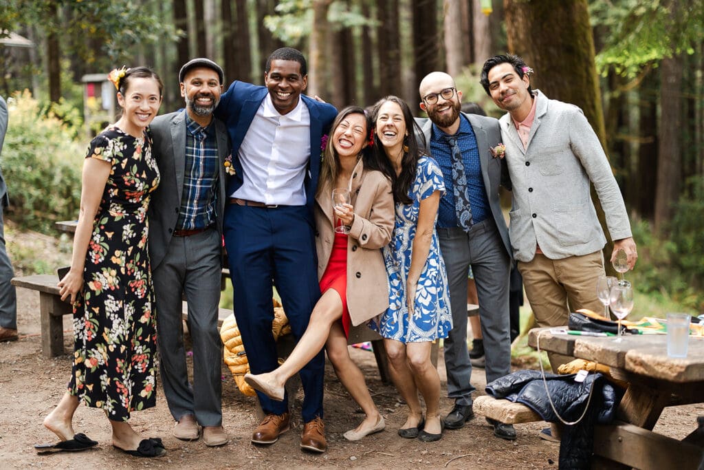 Guests reconnecting during cocktail hour at a Mendocino Woodlands wedding venue