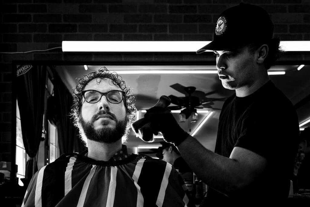 Groomsmen getting ready with their Sonoma wedding party at True Gents Barbershop in Sonoma.