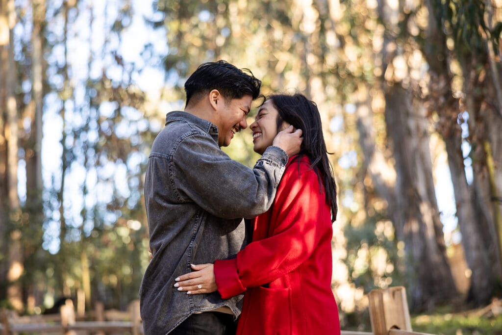 Couple walking through Monarch Butterfly Sanctuary in Pacific Grove