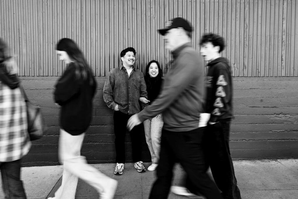 Playful engagement photos along Cannery Row