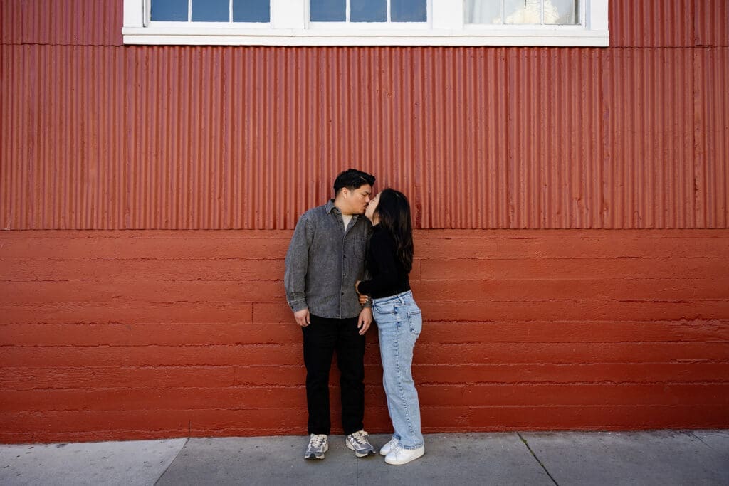 Playful engagement photos along Cannery Row