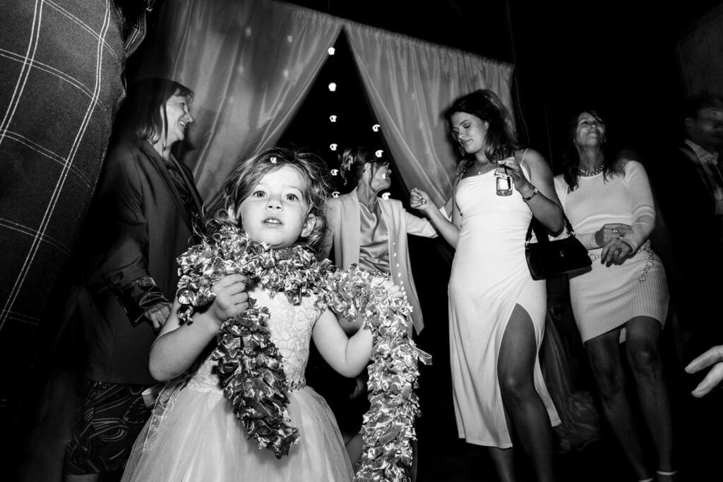 Guests dancing at barn reception at Olympias Valley Estate wedding