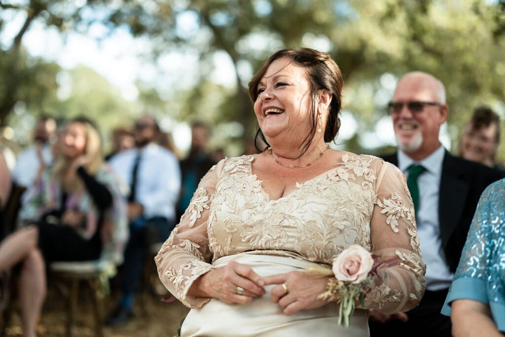 Mother of the bride enjoys Sonoma County wedding ceremony.