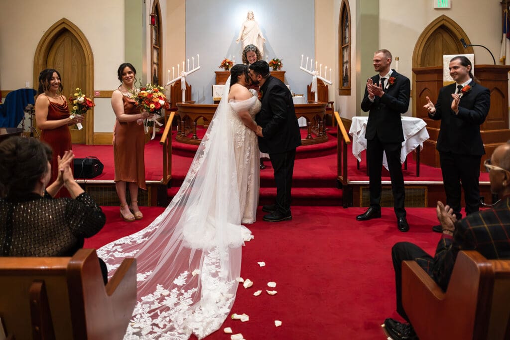 Bride and groom kiss at Elim Church Wedding ceremony, Petaluma, CA.