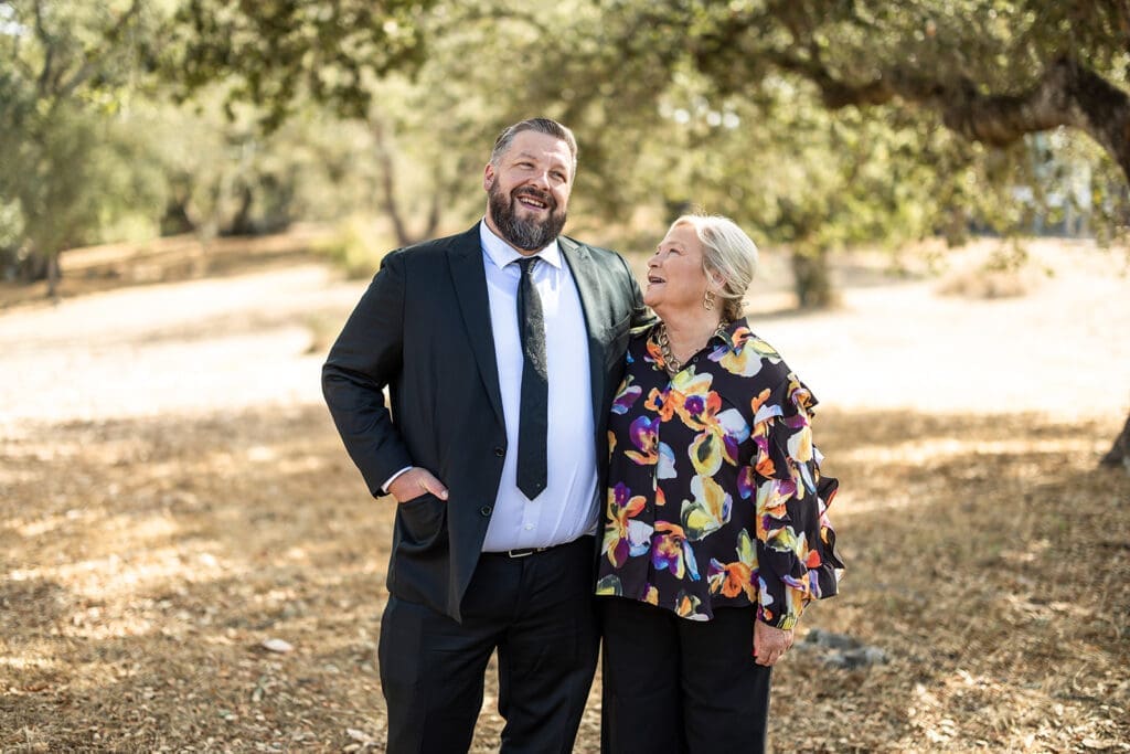 family photos at Sonoma County backyard wedding with vineyard backdrop