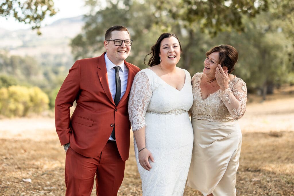 family photos at Sonoma County backyard wedding with vineyard backdrop