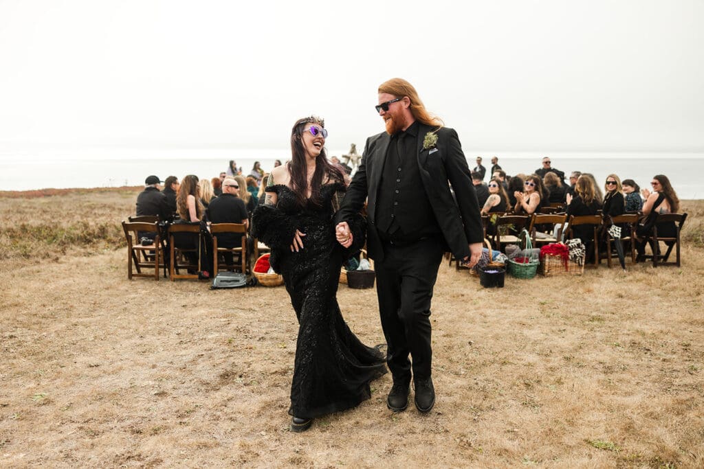 Couple exits their non-traditional wedding ceremony at Point Cabrillo Lighthouse.