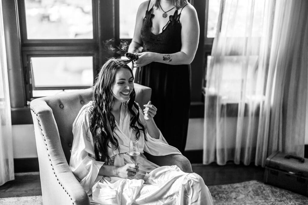 Bride getting ready at Noyo Harbor Inn before Fort Bragg wedding ceremony