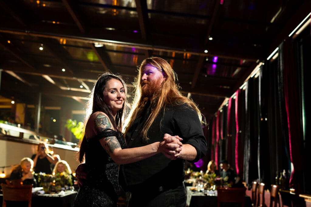 Vibrant uplighting at non-traditional Fort Bragg wedding reception