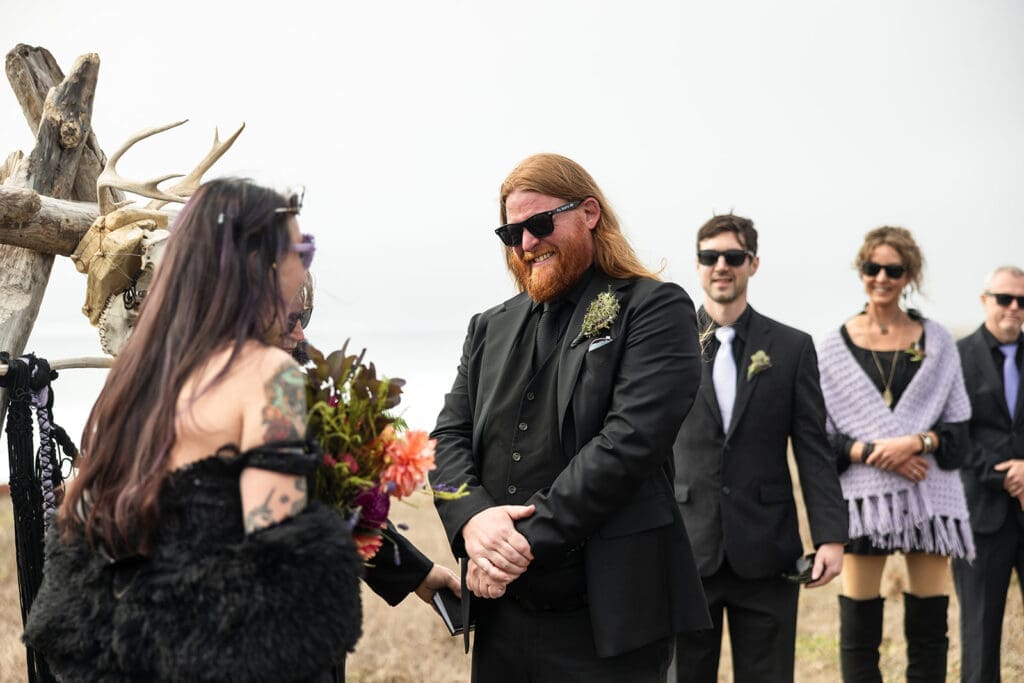 Groom tearing up as bride arrives at the altar at Point Cabrillo Lighthouse wedding