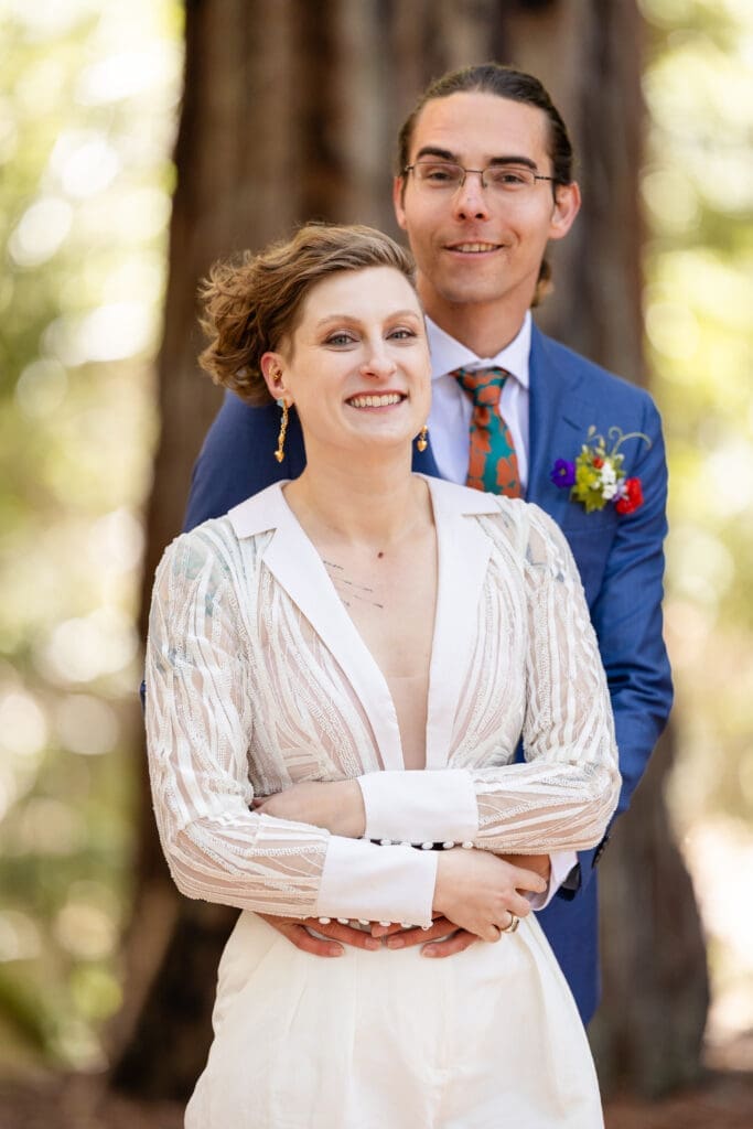 Couple takes windy wedding portraits in Mendocino Redwoods