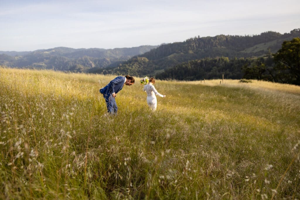 Bride and groom golden hour portraits in an open field at Leonard Lake Reserve