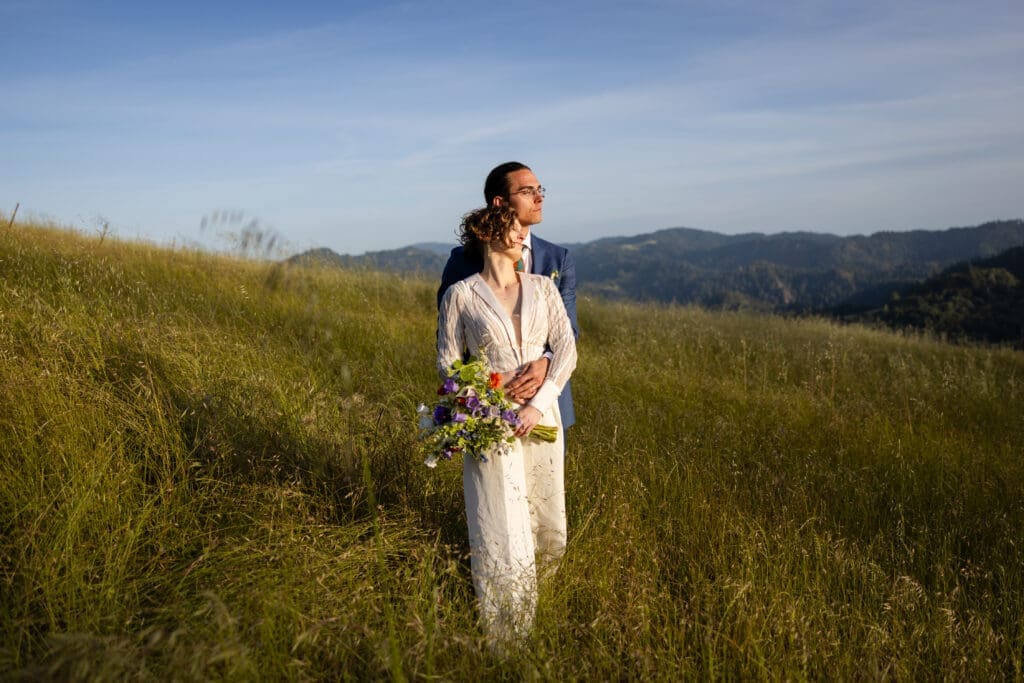 Bride and groom golden hour portraits in an open field at Leonard Lake Reserve