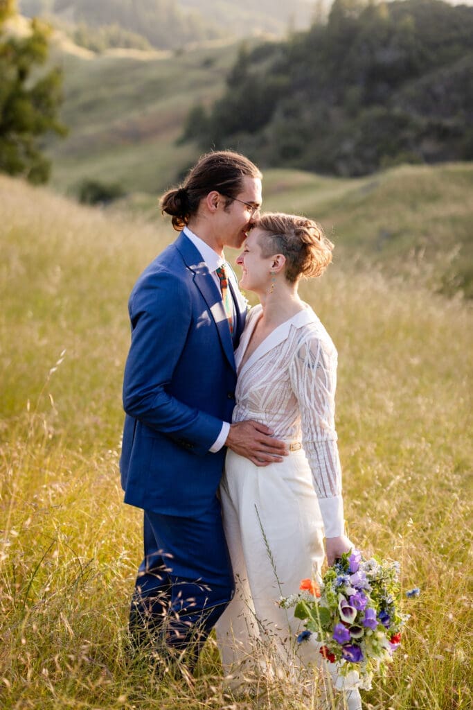 Bride and groom golden hour portraits in an open field at Leonard Lake Reserve