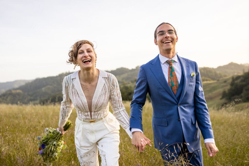 Bride and groom golden hour portraits in an open field at Leonard Lake Reserve