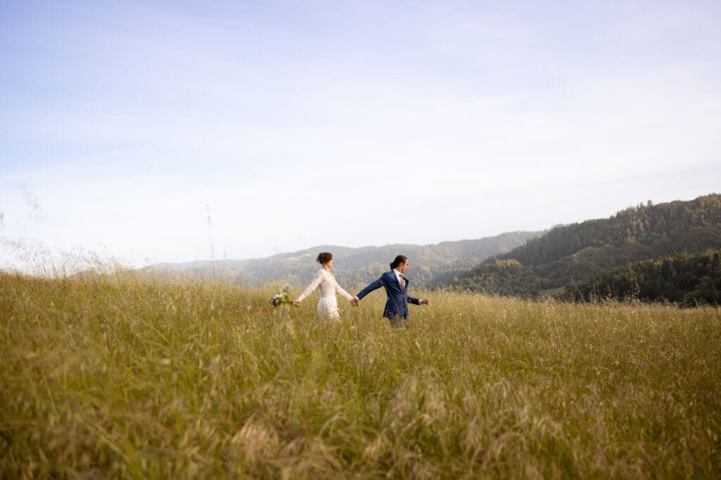 Bride and groom golden hour portraits in an open field at Leonard Lake Reserve