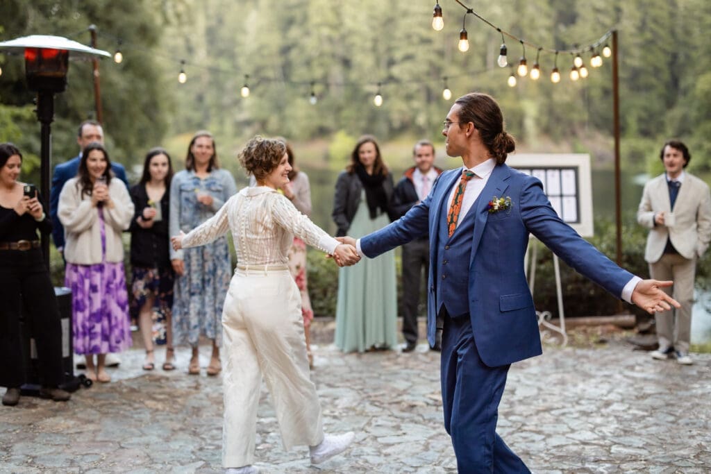 Wedding couple shares first dance overlooking Leonard Lake Reserve