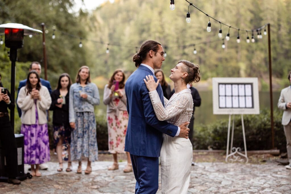 Wedding couple shares first dance overlooking Leonard Lake Reserve