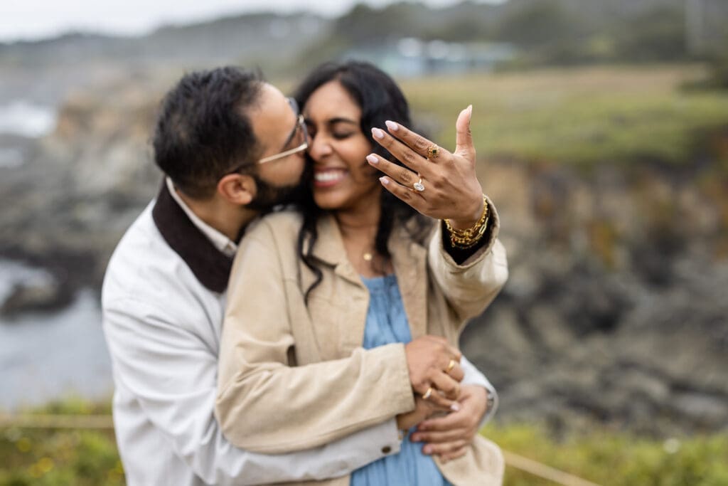 Bride shows off her ring after being proposed to at the Mendocino Botanical Gardens
